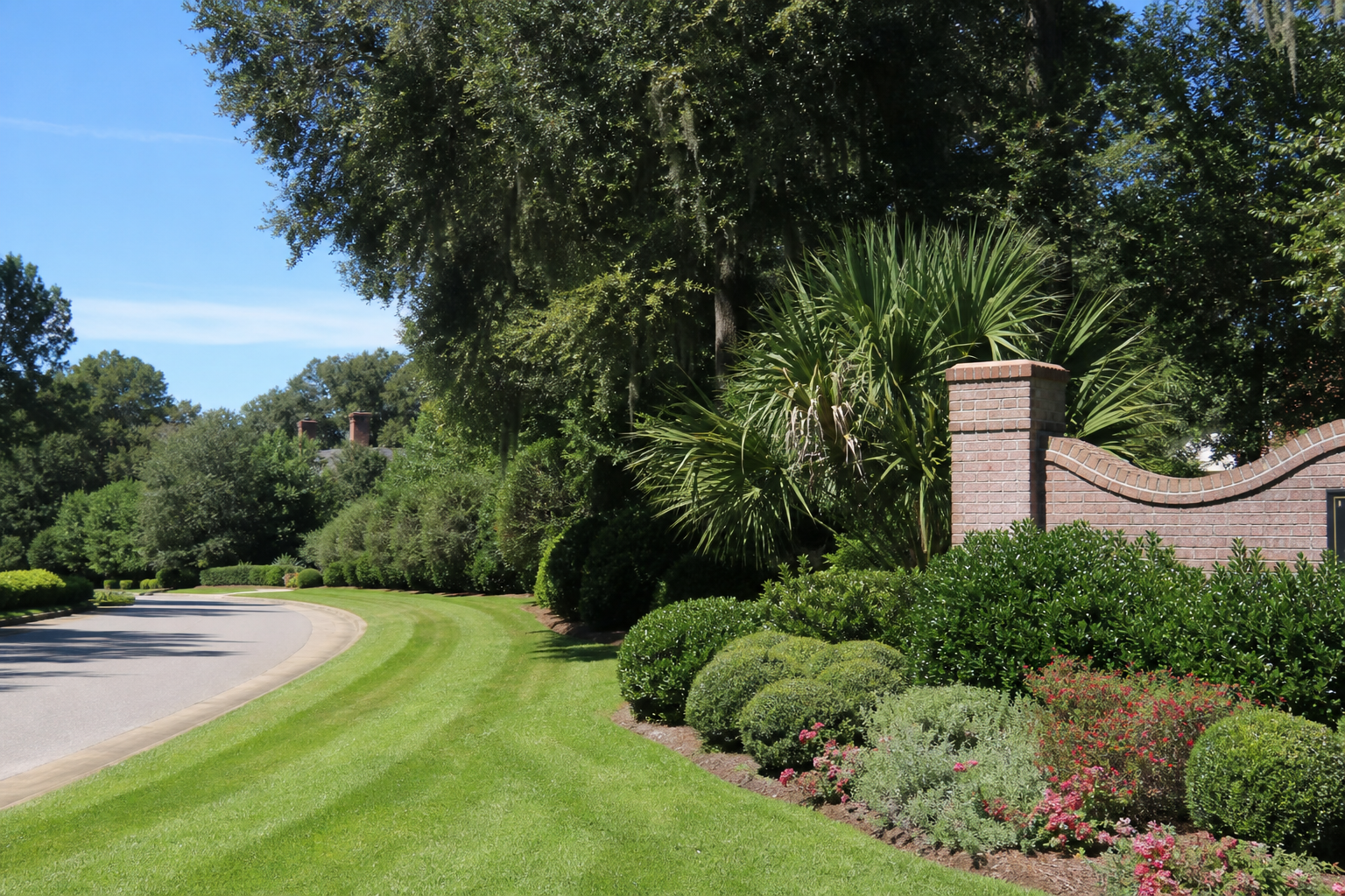 HOA-style entrance and turf presentation maintained through weekly lawn programs serving Johns Island, SC.